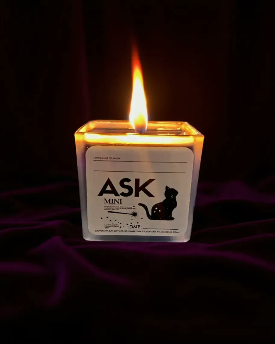 The Ask Mini — a single-wick candle in a 3 oz frosted square glass jar, a tarot card and message sealed in a tin under the wax